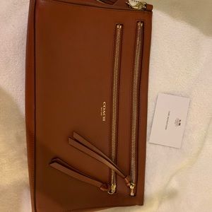 Coach hand pouch